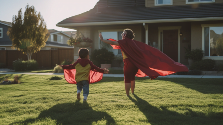 mom playing the hometown hero with her son on the front lawn in front of their house.